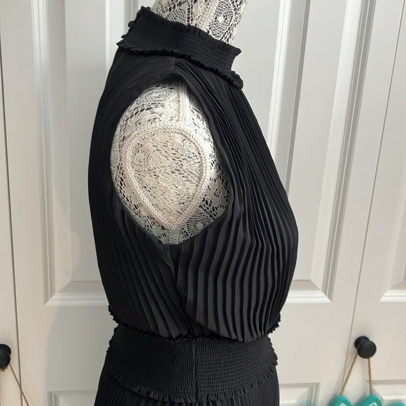 Fabulous LBD blouson dress featuring a smocked waist & accordion pleats - Picture 6 of 15